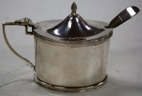 Lot 182 - A George V silver mustard with blue glass...