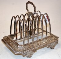 Lot 203 - A late Georgian silver 6-division toast rack...