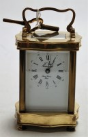Lot 216 - A French lacquered brass cased carriage clock,...