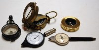 Lot 252 - A brass cased prismatic compass; together with...