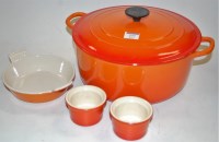 Lot 277 - A Le Creuset casserole dish and cover;...