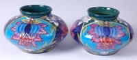 Lot 4 - A pair of modern Moorcroft pottery vases in...