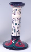 Lot 12 - A Moorcroft pottery table candlestick in the...