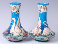 Lot 13 - A pair of limited edition Moorcroft pottery...