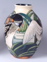 Lot 26 - A Moorcroft pottery vase in the Torridon...