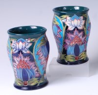 Lot 41 - A pair of Moorcroft pottery vases in the...