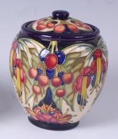 Lot 53 - A Moorcroft pottery biscuit barrel and cover...