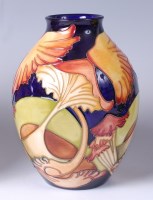 Lot 86 - A Moorcroft pottery vase in the Parasol Dance...