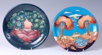 Lot 92 - A Moorcroft pottery plate in the Wanderers Sky...