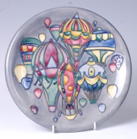Lot 98 - A Moorcroft pottery plate in the Balloons...