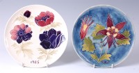 Lot 103 - A Moorcroft pottery year plate for 1984 in the...