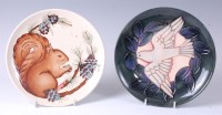 Lot 104 - A limited edition Moorcroft pottery year plate...