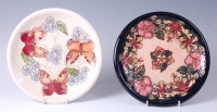 Lot 110 - A Moorcroft pottery plate in the Oberon...