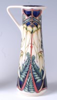 Lot 117 - A Moorcroft pottery ewer in the Kowhai Flower...