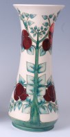 Lot 123 - A Moorcroft pottery vase in the Plum Tree &...