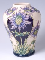 Lot 124 - A Moorcroft pottery vase in the Caledonian...