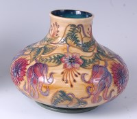 Lot 125 - A Moorcroft pottery vase in the Tahiti pattern,...