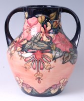Lot 126 - A Moorcroft pottery vase in the Oberon pattern,...