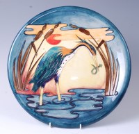 Lot 137 - A large Moorcroft pottery charger in the Heron...