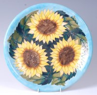 Lot 139 - A large Moorcroft charger in the Sunflower...