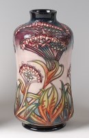 Lot 177 - A Moorcroft pottery vase in the Gypsy pattern,...