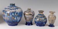 Lot 202 - Four various Cobridge stoneware vases in the...