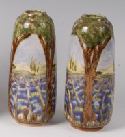 Lot 208 - A pair of Cobridge stoneware vases in the...