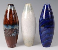 Lot 209 - A Cobridge stoneware slender ovoid vase in the...