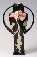Lot 228 - A Black Ryden pottery vase in the Papaver...