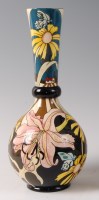Lot 252 - A limited edition Black Ryden pottery vase in...