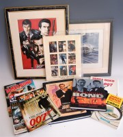 Lot 837 - Mixed lot of James Bond pictures and books, to...
