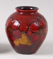 Lot 310 - An early 20th century Moorcroft pottery squat...