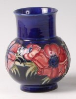 Lot 313 - An early 20th century Moorcroft pottery squat...