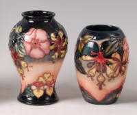 Lot 327 - A small modern Moorcroft pottery vase in the...