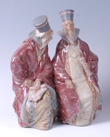 Lot 357 - A Lladro glazed pottery figure group of two...