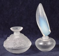 Lot 369 - A Lalique moulded crystal glass scent bottle...