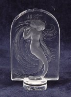 Lot 375 - A Lalique Naiade crystal glass mermaid stand,...