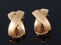 Lot 407 - A pair of contemporary 18ct gold clip earrings,...