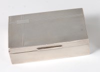Lot 419 - An Art Deco silver table cigarette box, having...