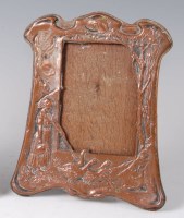 Lot 460 - An Art Nouveau embossed silver plated easel...