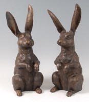 Lot 502 - A pair of contemporary bronze models of seated...