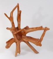 Lot 647 - A contemporary stained root wood floor carving,...