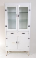 Lot 648 - A 1950s white painted steel medicine cabinet,...