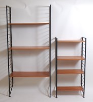 Lot 653 - Two 1970s Ladderax teak and metal systematic...