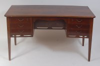 Lot 671 - A 1950s Danish walnut and figured walnut...