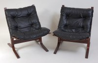 Lot 690 - A pair of Danish formed laminate and black...