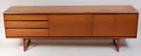 Lot 693 - A 1960s teak long sideboard by White & Newton...