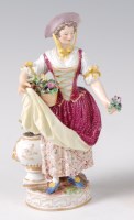 Lot 1026 - A Meissen Marcolini figure of a flower-seller,...