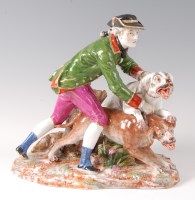 Lot 1028 - A late 19th century Dresden porcelain group...