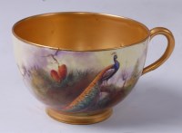 Lot 1049 - A Worcester porcelain teacup, decorated with a...